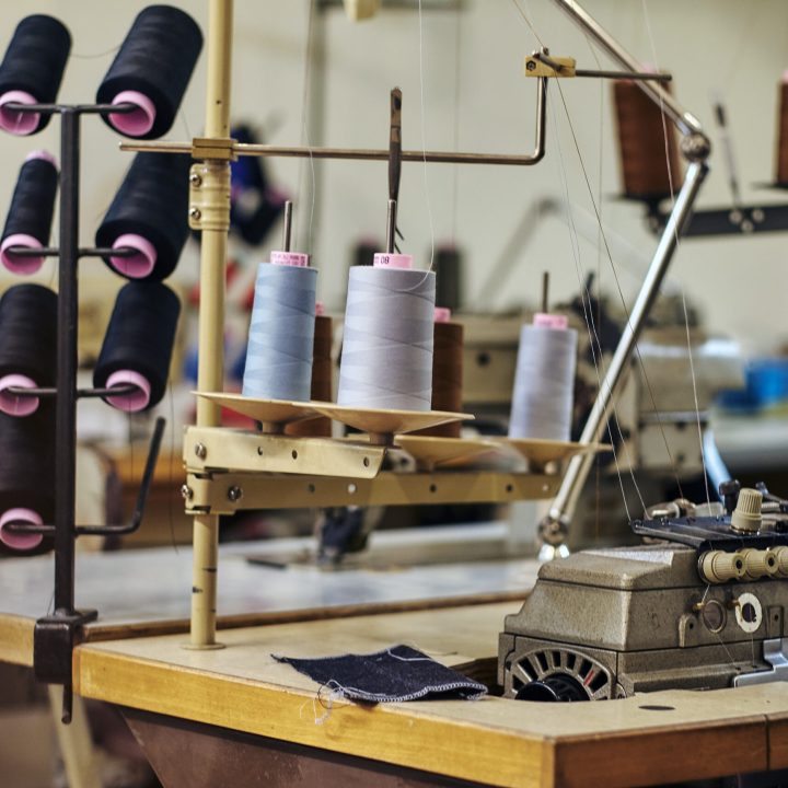 5 Close-up image of a lot of coils with a threads at the sewing workshop.